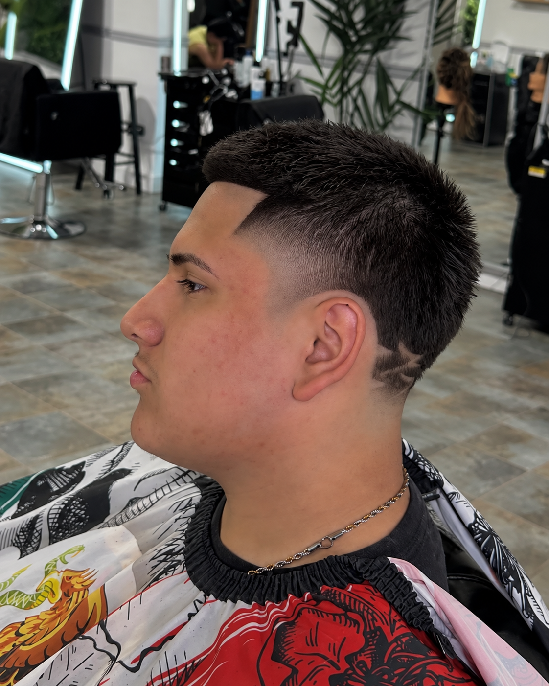 Real client haircut with a clean fade at Tulum Hair Studio